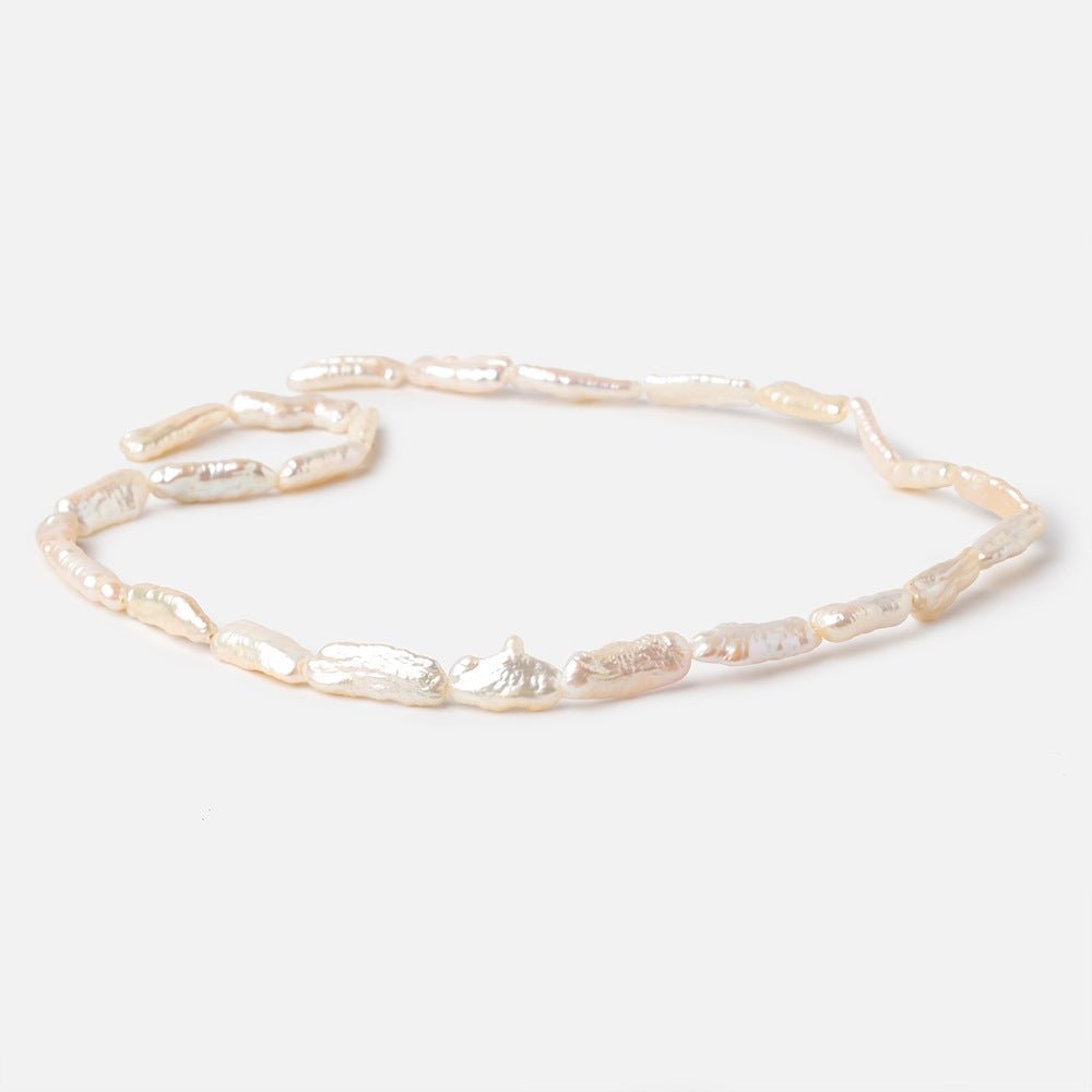 13x6-17x7mm Peach Straight Drill Biwa Freshwater Pearls 15.5 inch 22 Beads