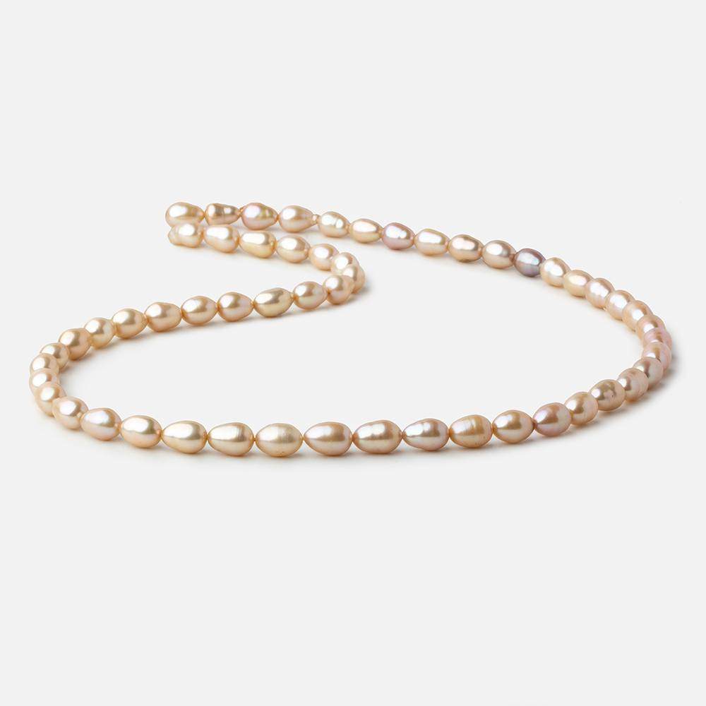 5.5x4.5-6.5x5mm Golden Beige straight drilled Oval freshwater pearls 16 inch 64 pieces A