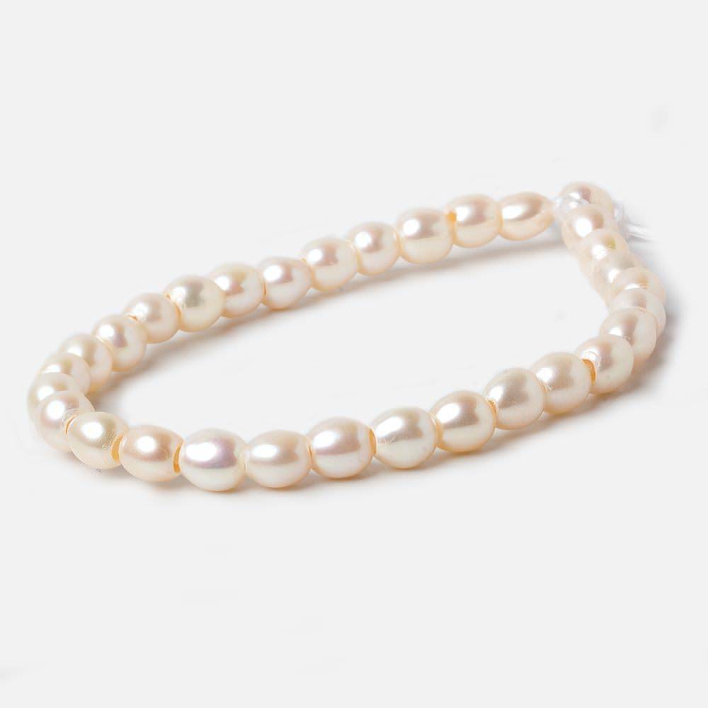 6.5x6.5mm Creamy White Straight Drilled Oval Large Hole pearls 8 inch 30 pieces AA