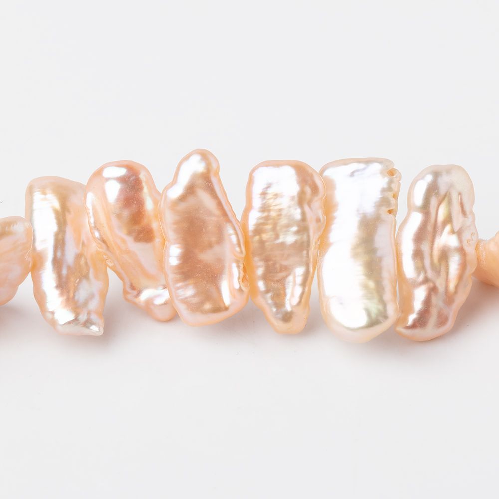 12x7-18x8mm Rosy Peach Side Drill Biwa Freshwater Pearls 16 inch 54 Beads