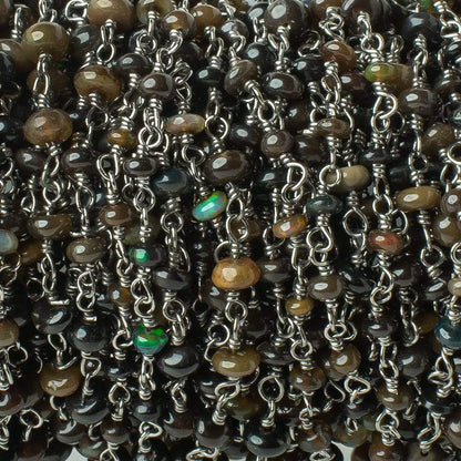3-4mm Black Ethiopian Opal plain rondelle Black Gold on Silver .925 Chain