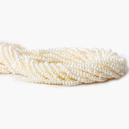 2.5-3mm Off White Center Drilled Button Freshwater Pearl 250 pieces