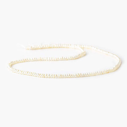 2.5-3mm Off White Center Drilled Button Freshwater Pearl 250 pieces