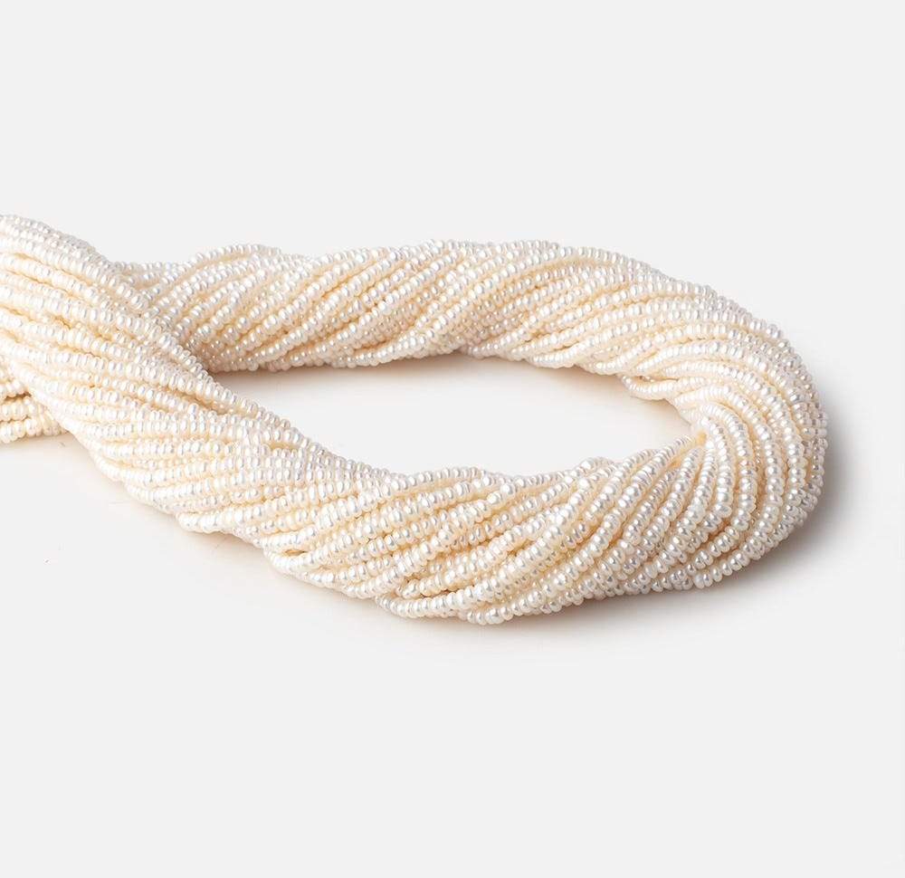 2.5mm Off White Center Drilled Button Freshwater Pearls 15.5 inch 305 pieces