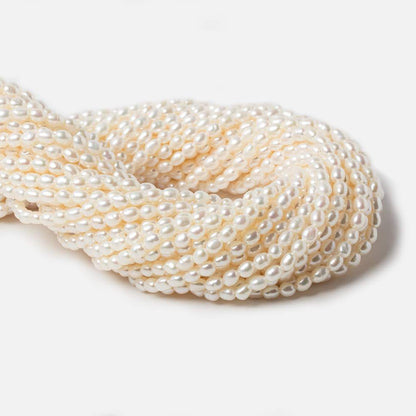 3mm Cream Straight Drilled Oval Freshwater Pearls 16 inch 117 pieces