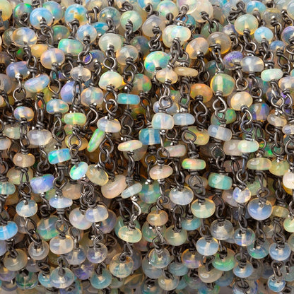 3mm Ethiopian Opal Plain Rondelles on Black Gold over .925 Chain