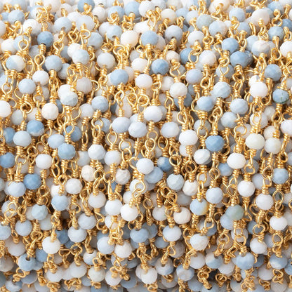 3mm Owyhee Denim Blue Opal Micro Faceted Rondelles on Gold Plated Chain