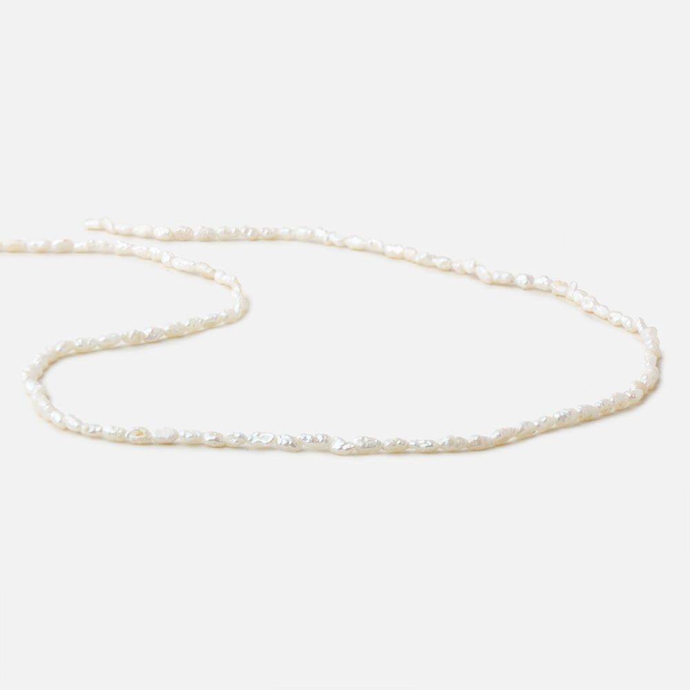 3x2.5-5x2.5mm Off White straight drilled Baroque Rice Freshwater Pearls 16 inch 95 pieces