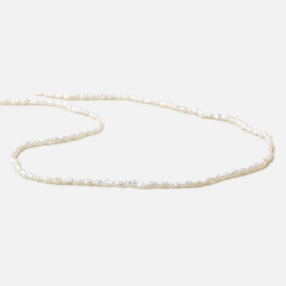 3x2.5-5x2.5mm Off White straight drilled Baroque Rice Freshwater Pearls 16 inch 95 pieces