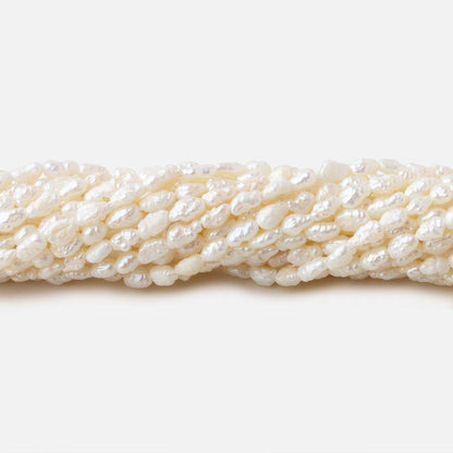 3x2.5-5x2.5mm Off White straight drilled Baroque Rice Freshwater Pearls 16 inch 95 pieces