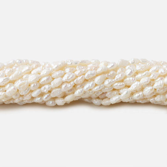 3x2.5-5x2.5mm Off White straight drilled Baroque Rice Freshwater Pearls 16 inch 95 pieces