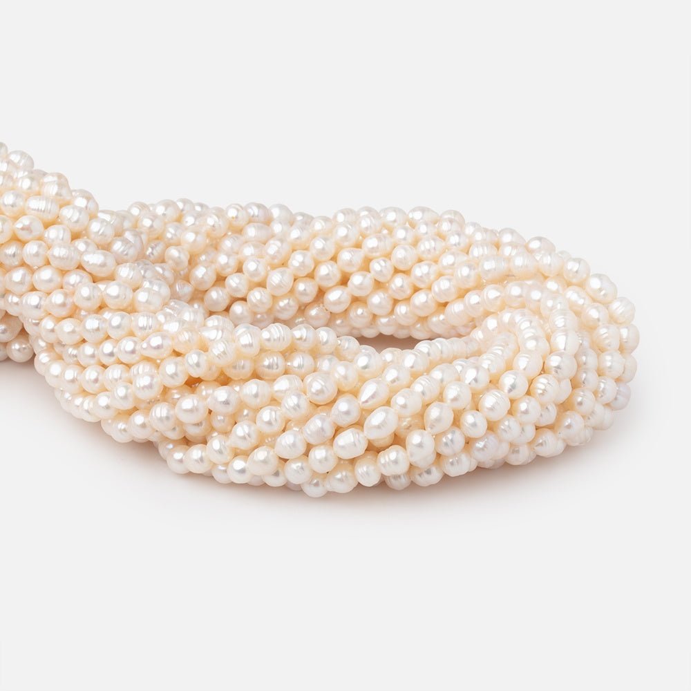 4-5mm Creamy Petite Ringed Baroque Freshwater Pearls 16 inch 78 Beads