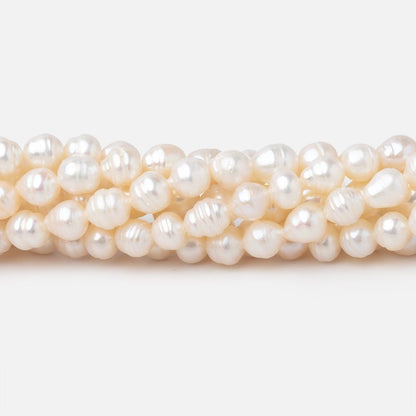 4-5mm Creamy Petite Ringed Baroque Freshwater Pearls 16 inch 78 Beads