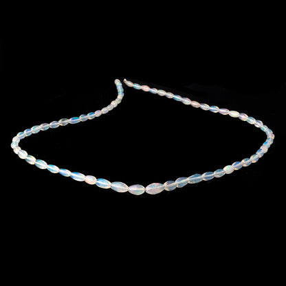 4-9.5mm Ethiopian Opal Plain Rice Beads 18 inch 66 pieces AA