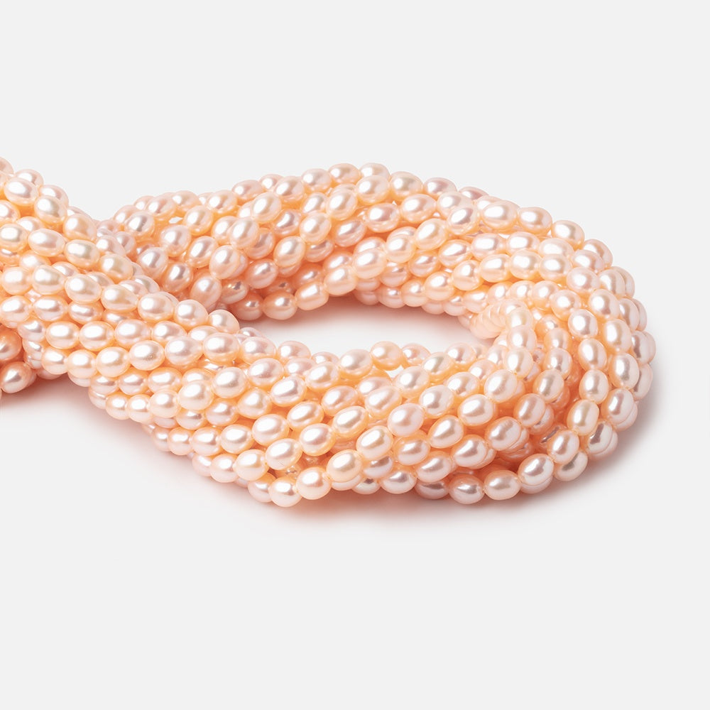 7x5mm Peach Straight Drill Oval Freshwater Pearl 15 inch 56 pcs