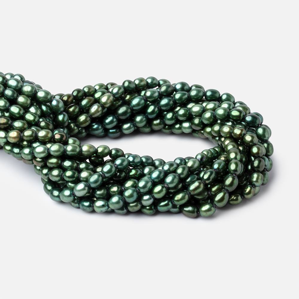 7x5mm Spearmint Green Straight Drilled Oval Pearls 15 inch 63 pieces