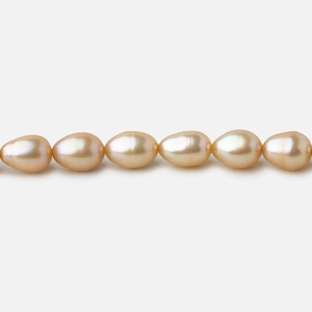 5.5x4.5-6.5x5mm Golden Beige straight drilled Oval freshwater pearls 16 inch 64 pieces A