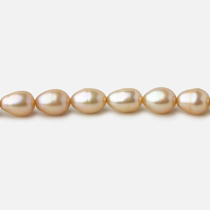 5.5x4.5-6.5x5mm Golden Beige straight drilled Oval freshwater pearls 16 inch 64 pieces A