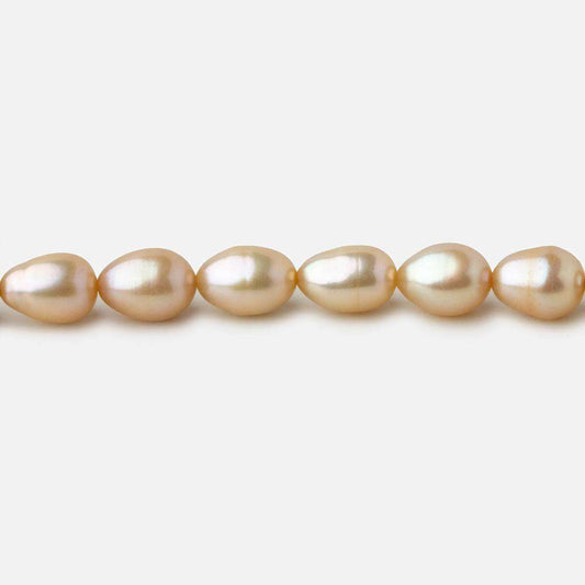 5.5x4.5-6.5x5mm Golden Beige straight drilled Oval freshwater pearls 16 inch 64 pieces A