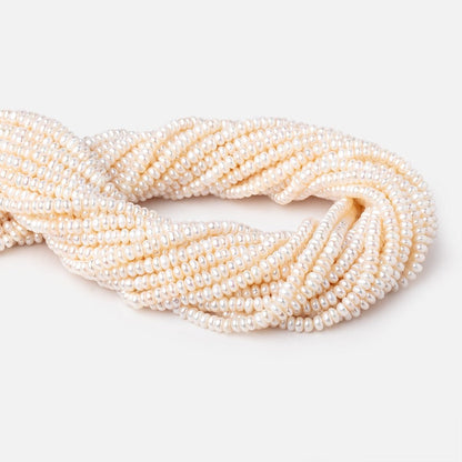 4mm Cream Center Drilled Button Freshwater Pearls 15 inch 140 pieces AA