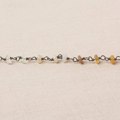 4mm Ethiopian Opal plain rondelle Black Gold over .925 Silver Chain