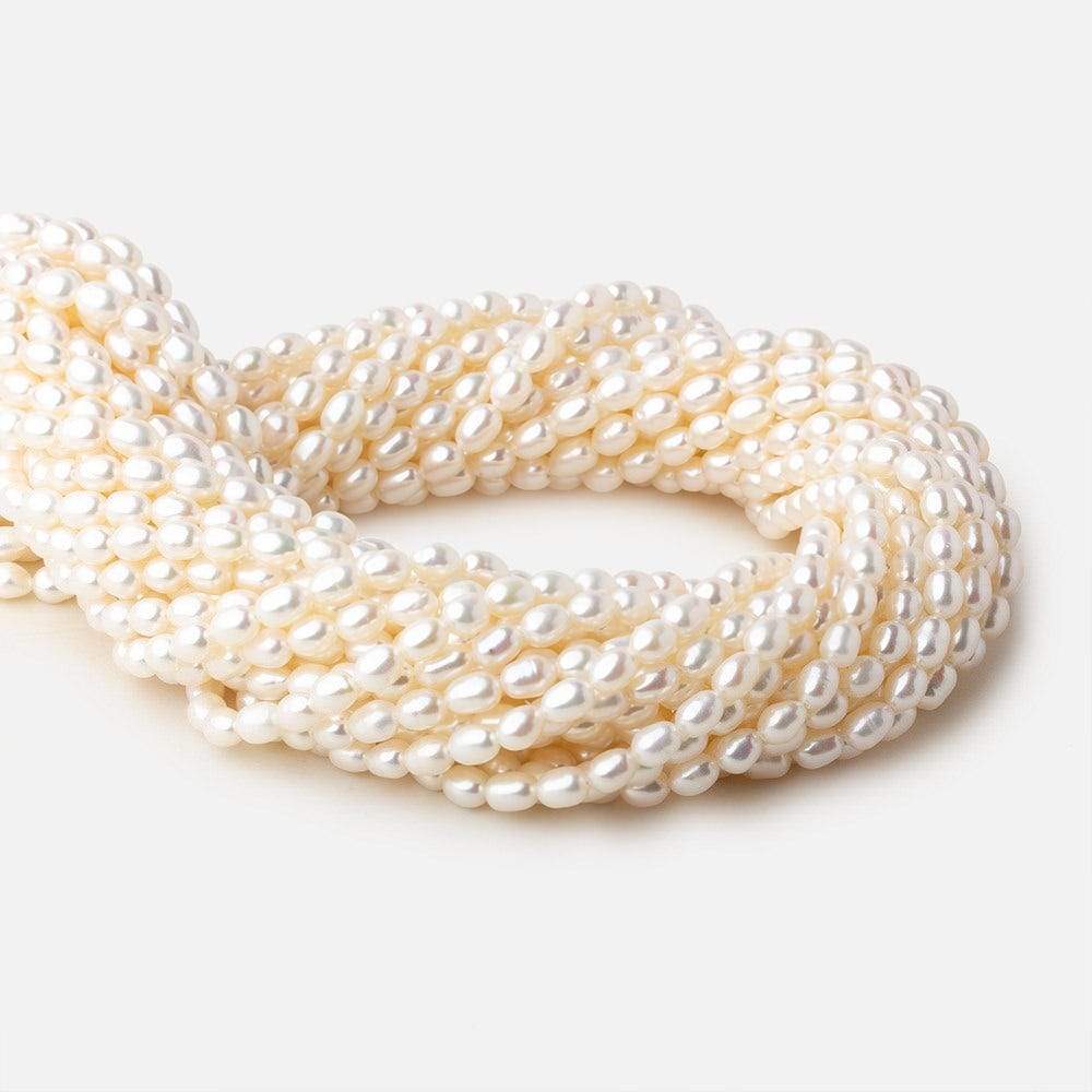 4x5-4.5x6mm Off White straight drilled Oval freshwater pearls 15.5 inch 68 pieces A