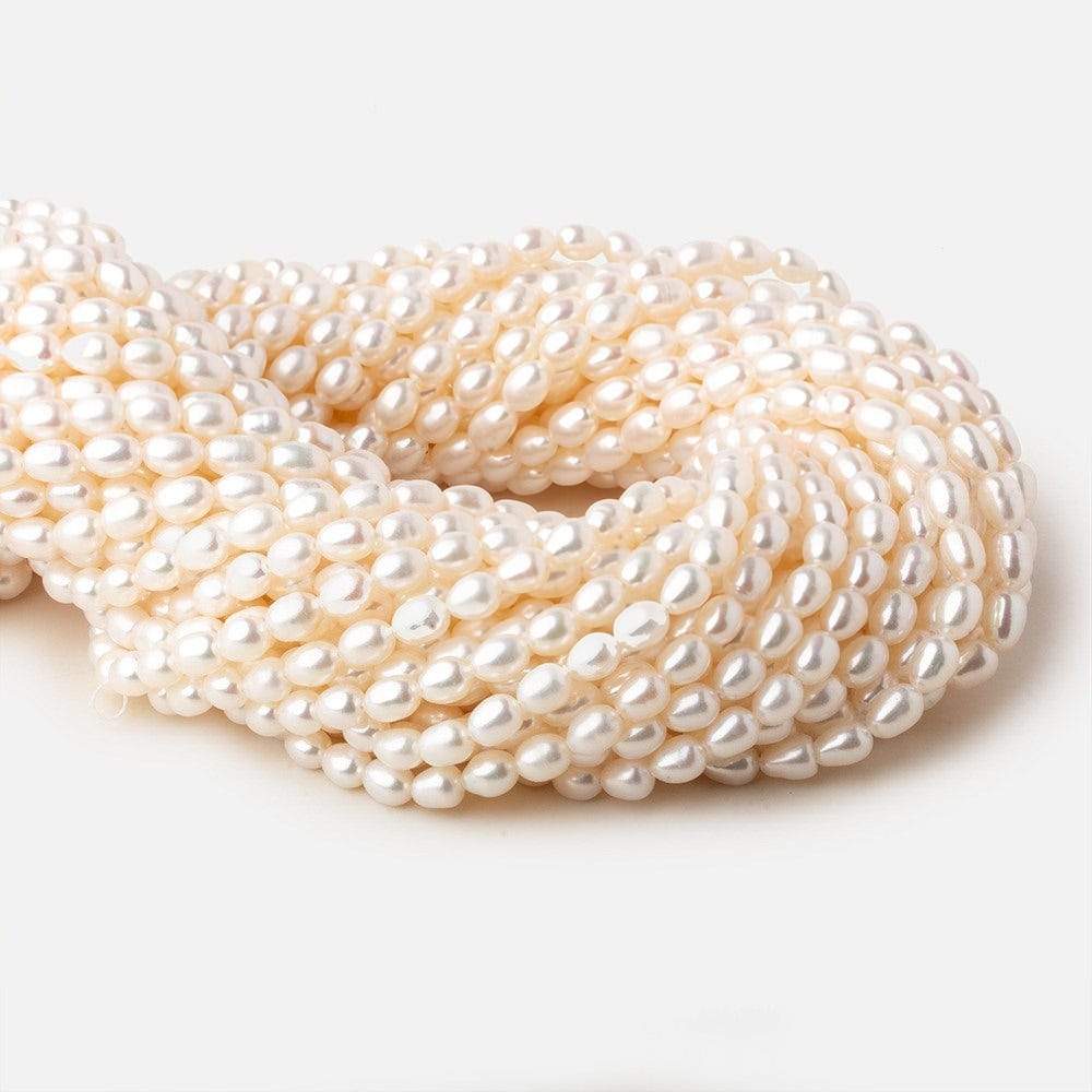 5.5x4-7x4.5mm Off White straight drilled Oval freshwater pearls 15.5 inch 65 pieces A