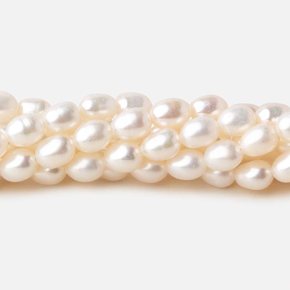 5.5x4-7x4.5mm Off White straight drilled Oval freshwater pearls 15.5 inch 65 pieces A
