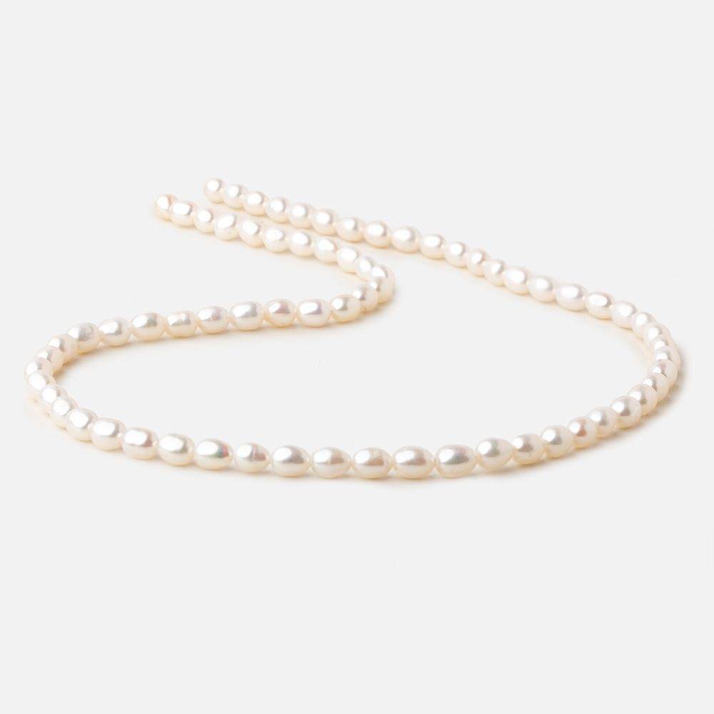 5.5x4-7x4.5mm Off White straight drilled Oval freshwater pearls 15.5 inch 65 pieces A