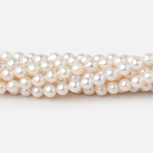 5-5.5mm Creamy White Petite Baroque Freshwater Pearls 15 inch 70 Beads