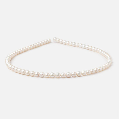 5-5.5mm Creamy White Petite Baroque Freshwater Pearls 15 inch 70 Beads