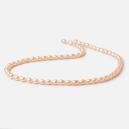 5-5.5mm Peach Petite Oval Freshwater Pearls 15.75 inch 75 Beads