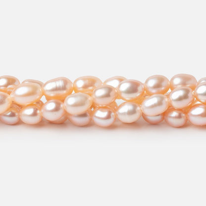 5-5.5mm Peach Petite Oval Freshwater Pearls 15.75 inch 75 Beads