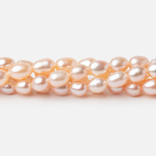 5-5.5mm Peach Petite Oval Freshwater Pearls 15.75 inch 75 Beads