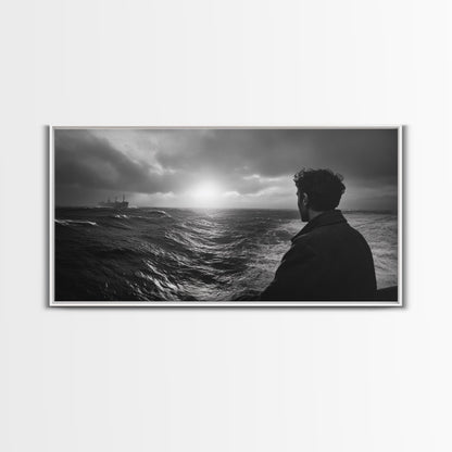 Mann beobachtet Meer, stürmischer Ozeanblick, emotionale Szene, Leinwanddruck, stimmungsvolle Küstendekoration, Wandbild fürs Büro, maritimer Monochrom-Stil
