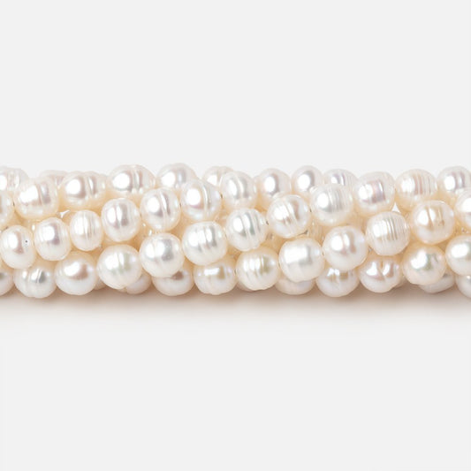 5.5mm Creamy White Ringed Baroque Freshwater Pearls 15 inch 68 Beads
