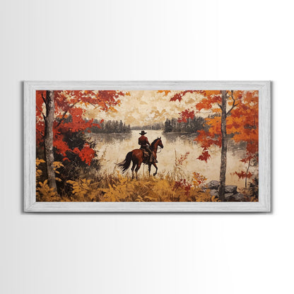 Cowboy on mountainside with red autumn leaves rugged cliffs, Framed Canvas Print, fall landscape wall art, western decor with warm colors