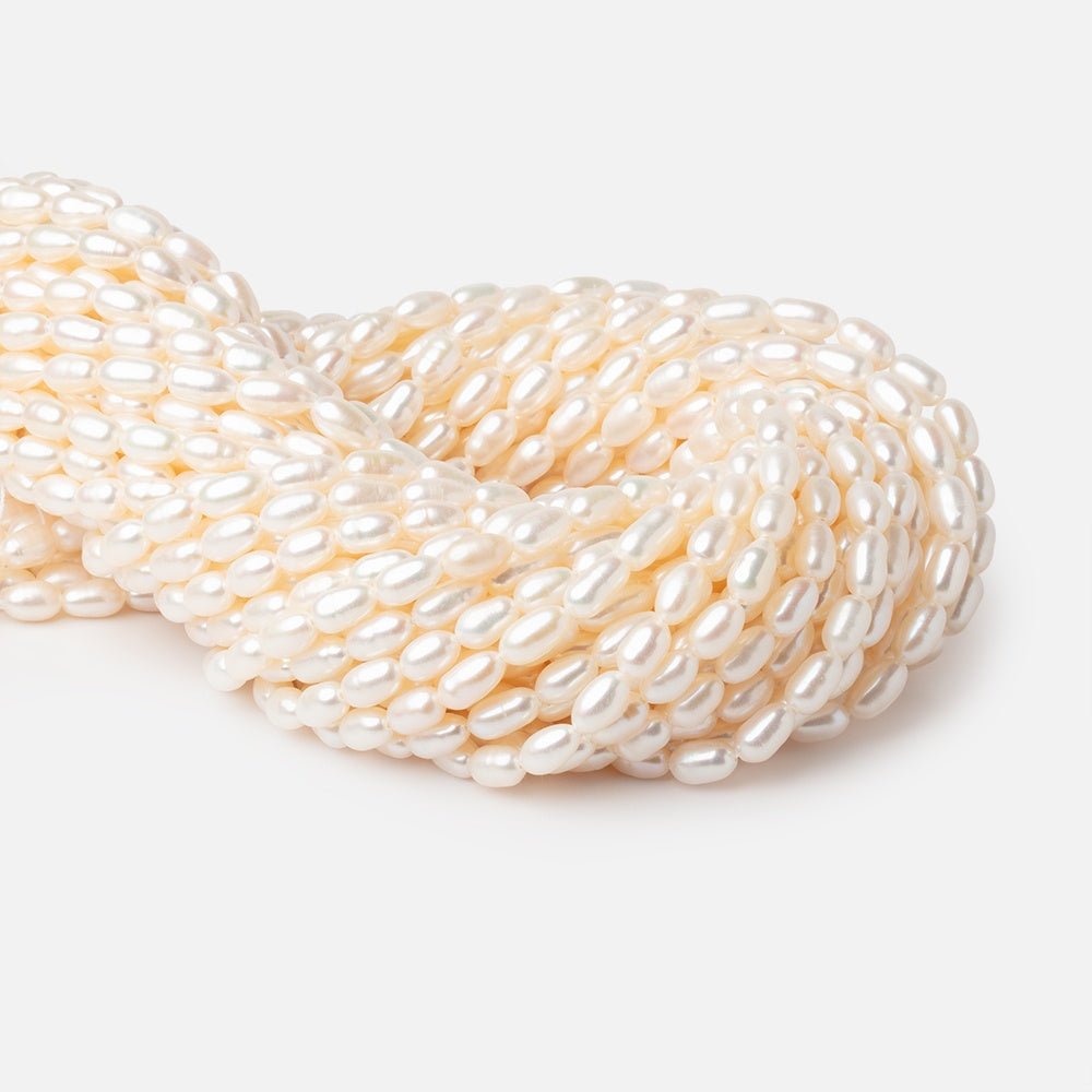 6.5-9mm Creamy White Oval Freshwater Pearls 15 inch 40 Beads