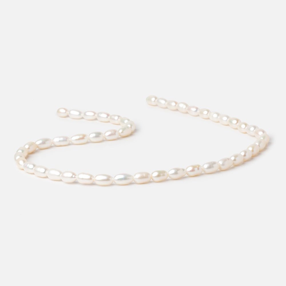 6.5-9mm Creamy White Oval Freshwater Pearls 15 inch 40 Beads