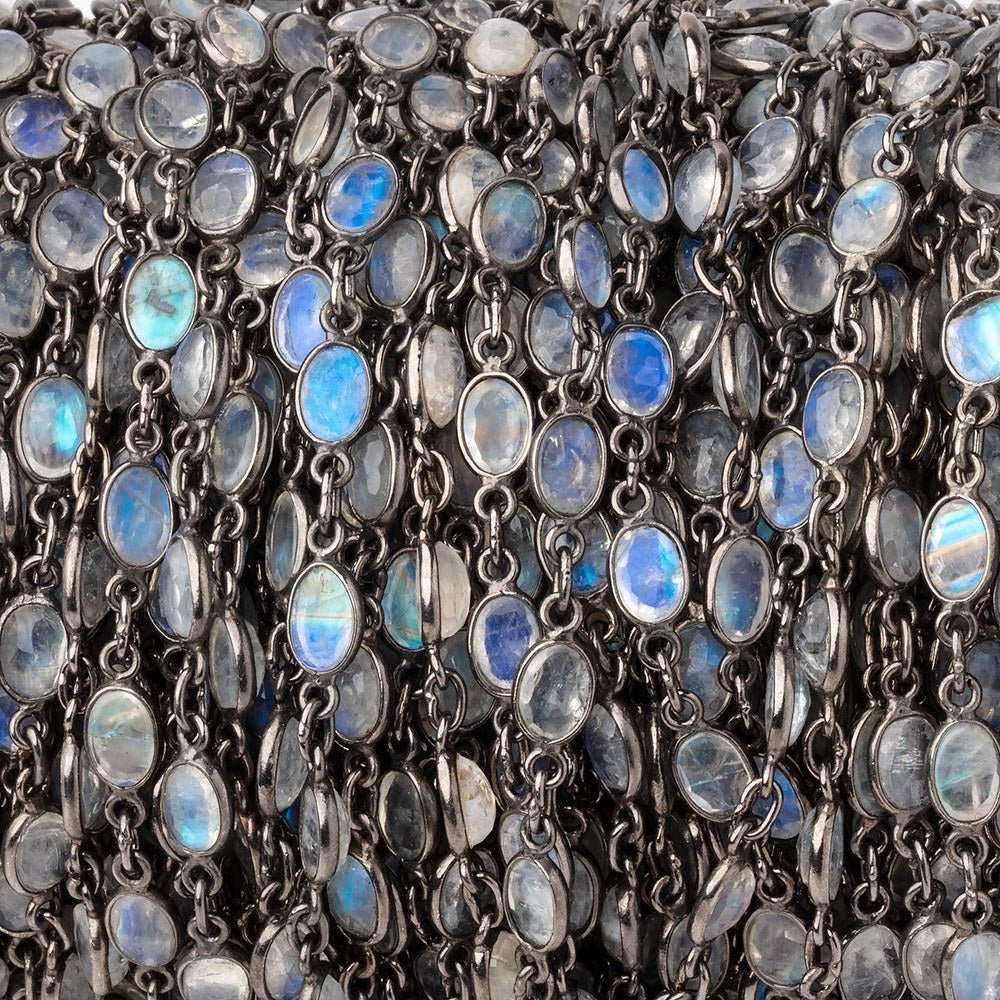 6x5mm Rainbow Moonstone Faceted Oval Cabochon Black Gold .925 Bezeled Chain
