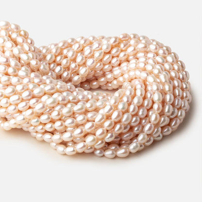 6x7mm White straight drilled Oval freshwater pearls 15 inch 52 pieces A