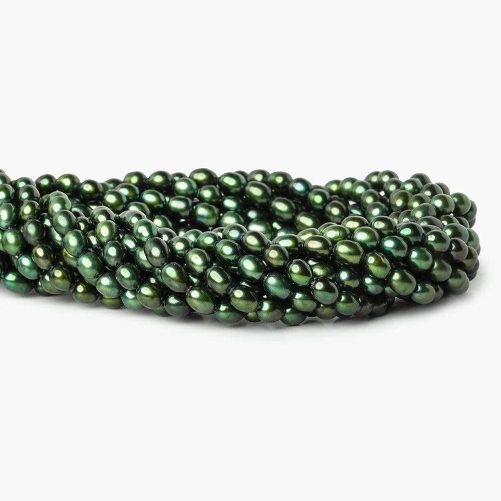 7mm Emerald Green Straight Drilled Oval Pearls, 15 inch, 63 pieces