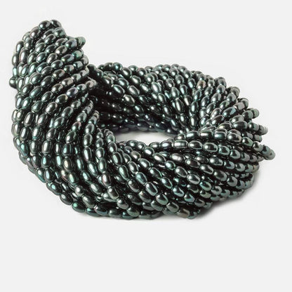 7x5Platinum Peacock Large Hole Oval Freshwater Pearls 15 inch 48 pcs