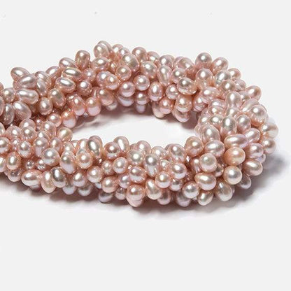 7x5-8x6mm Peachy Pink Top Drilled Oval Freshwater Pearls 16 inch 74 pieces