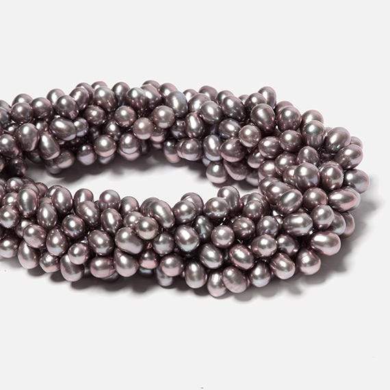 7x5-8x6mm Rose' Silver Top Drilled Oval Freshwater Pearl 16 inch 86 pieces