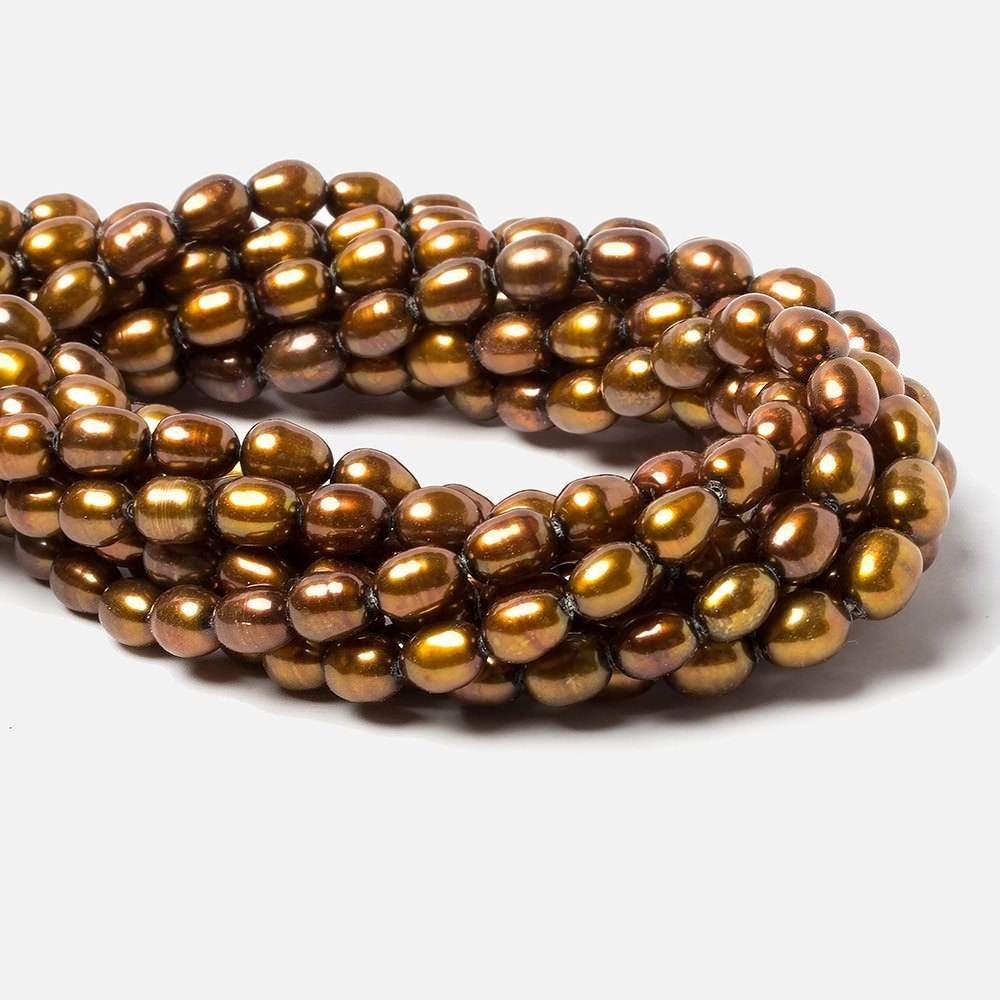 8x5mm Golden straight drilled oval pearls 16 inch 55 pieces