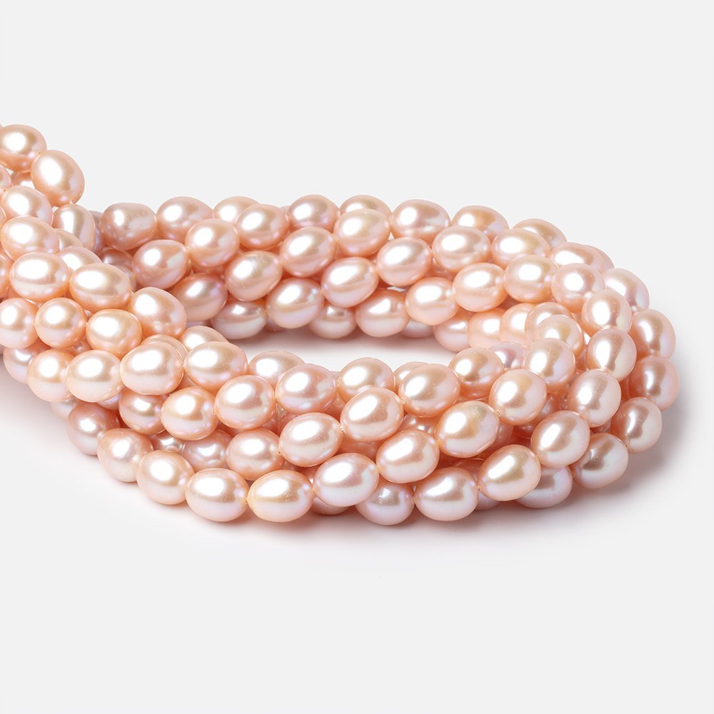 9-11mm Petal Pink Oval Freshwater Pearls 16 inch 36 Beads