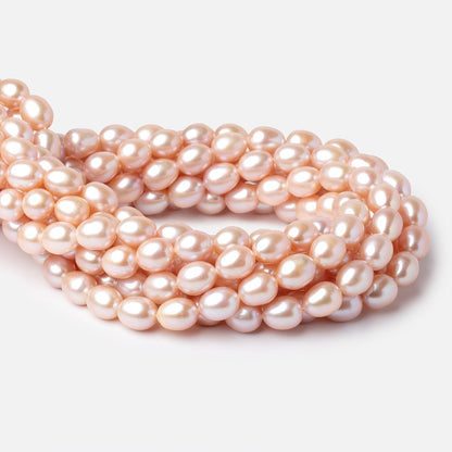 9-11mm Petal Pink Oval Freshwater Pearls 16 inch 36 Beads
