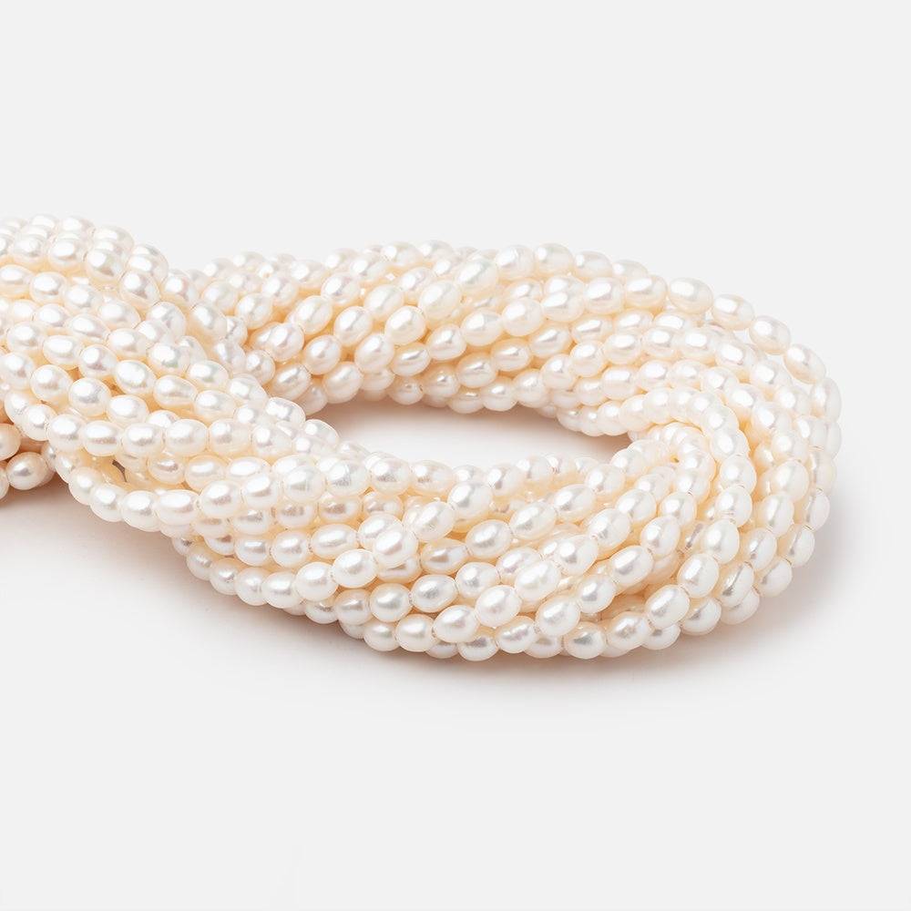 6x4.5mm Off White Oval 1.5mm Drill Hole Freshwater Pearls 61 pieces