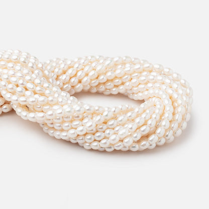 6x4.5mm Off White Oval 1.5mm Drill Hole Freshwater Pearls 61 pieces